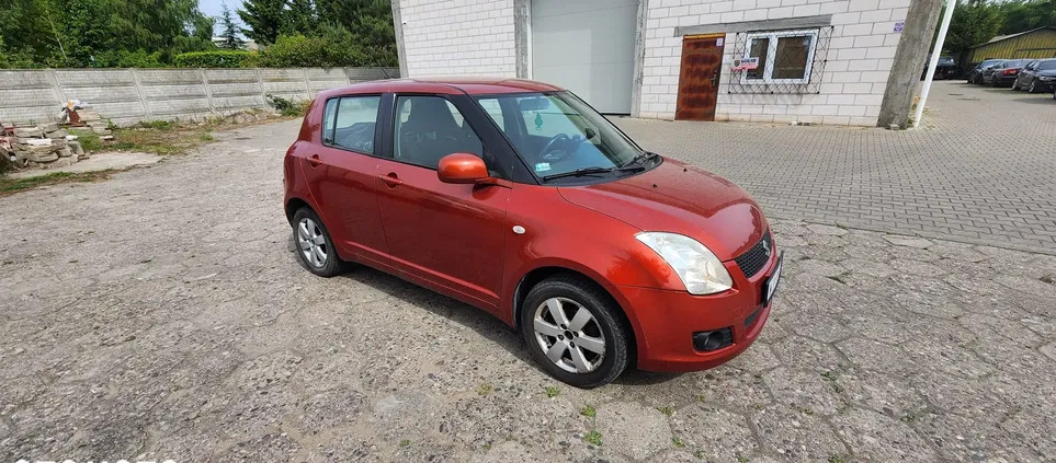 samochody osobowe Suzuki Swift cena 12900 przebieg: 156230, rok produkcji 2009 z Warszawa